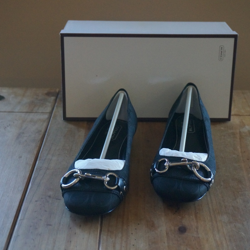 Coach Bliss Black Flats.  Brand new.  Never worn.